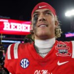 Mississippi Rebels quarterback Jaxson Dart (2) celebrates after beating the Duke Blue Devils in the Gator Bowl at EverBank Stadium.