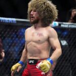 Sean O'Malley of the United States (red gloves) fights Merab Dvalishvili of Georgia (blue gloves) during Riyadh Season Noche UFC 306 at The Sphere.