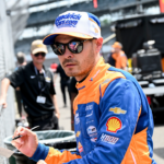 Arrow McLaren/Rick Hendrick driver Kyle Larson (17) signs autographs Monday, May 20, 2024, during practice for the 108th running of the Indianapolis 500 at Indianapolis Motor Speedway.