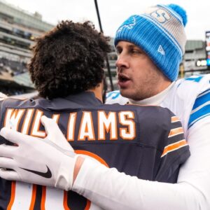 Detroit Lions quarterback Jared Goff (16) hugs Chicago Bears quarterback Caleb Williams (18) after 34-17 win at Soldier Field in Chicago, Ill. on Sunday, Dec. 22, 2024.
