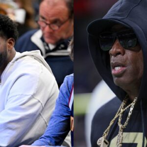 WATCH: Shedeur Sanders Puzzled at Mavericks Game as Father Deion Sanders Asks for TNT’s Greg Anthony’s Jacket