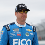 NASCAR Cup Series driver Kyle Busch walks on pit road during practice and qualifying for the Wurth 400 at Dover Motor Speedway.