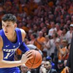 Tyler Herro (L) and John Calipari (R)