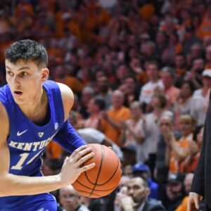 Tyler Herro (L) and John Calipari (R)