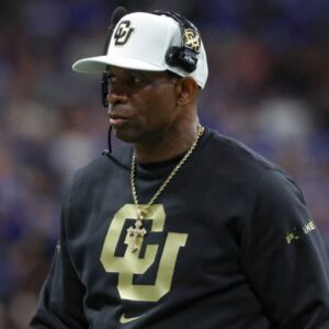 Dec 28, 2024; San Antonio, TX, USA; Colorado Buffaloes head coach Deion Sanders walks on the field during the game against the Brigham Young Cougars at Alamodome.