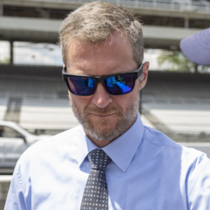 Dale Earnhardt Jr. signs an autograph before the Verizon 200 at the Indianapolis Motor Speedway Road Course.