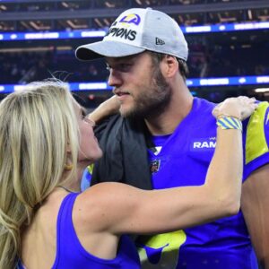 Los Angeles Rams quarterback Matthew Stafford (9) with wife Kelly Hall after defeating the San Francisco 49ers in the NFC Championship Game at SoFi Stadium.