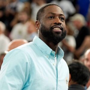 Dwyane Wade looks on at halftime between France and Canada in a men’s basketball quarterfinal game during the Paris 2024 Olympic Summer Games at Accor Arena.