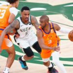 Phoenix Suns guard Chris Paul (3) against Milwaukee Bucks guard Jeff Teague (5) during game four of the 2021 NBA Finals at Fiserv Forum.