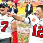 Tampa Bay Buccaneers quarterback Tom Brady (12) and tight end Rob Gronkowski (87) celebrate after beating the Kansas City Chiefs in Super Bowl LV at Raymond James Stadium.