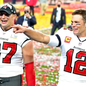Tampa Bay Buccaneers quarterback Tom Brady (12) and tight end Rob Gronkowski (87) celebrate after beating the Kansas City Chiefs in Super Bowl LV at Raymond James Stadium.