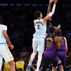 San Antonio Spurs center Victor Wembanyama (1) shoots the ball over Los Angeles Lakers forward Anthony Davis (3) during the first quarter at Crypto.com Arena.