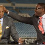 Dec 5, 2013; Jacksonville, FL, USA; Rich Eisen (left), Deion Sanders (center) and Michael Irvin on the NFL Network set before the game between the Houston Texans and the Jacksonville Jaguars at EverBank Field.