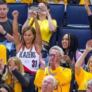 Dell Curry (far left), Sonya Curry (second from left), Ayesha Curry (second from right), and Sydel Curry (far right) watch during the third quarter in game one of the Western conference finals of the 2019 NBA Playoffs between the Golden State Warriors and the Portland Trail Blazers at Oracle Arena