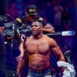 Francis Ngannou celebrates the win against Ciryl Gane during UFC 270 at Honda Center.