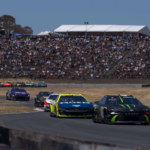 Jun 9, 2024; Sonoma, California, USA; NASCAR Cup Series driver Tyler Reddick (45) leads the group during the Toyota / Save Mart 350 at Sonoma Raceway. Mandatory Credit: Stan Szeto-Imagn Images