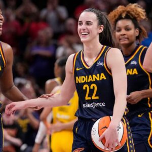 Indiana Fever forward Aliyah Boston (7) celebrates with Indiana Fever guard Caitlin Clark (22) altering recording a triple-double Wednesday, Sept. 4, 2024, during the game at Gainbridge Fieldhouse in Indianapolis. The Indiana Fever defeated the Los Angeles Sparks, 93-86.