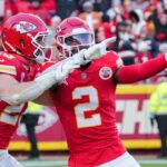 Kansas City Chiefs cornerback Joshua Williams (2) celebrates with linebacker Drue Tranquill (23) after a sack against the Houston Texans during the second half at GEHA Field at Arrowhead Stadium.
