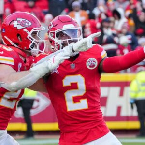 Kansas City Chiefs cornerback Joshua Williams (2) celebrates with linebacker Drue Tranquill (23) after a sack against the Houston Texans during the second half at GEHA Field at Arrowhead Stadium.