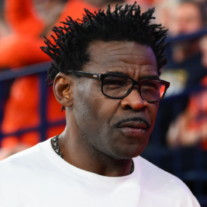 Miami Hurricanes former player and NFL Hall of Fame member Michael Irvin looks on during the first half of a game between the Miami Hurricanes and the Syracuse Orange at the JMA Wireless Dome