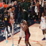 Golden State Warriors guard Gary Payton II (0) dunks the ball over Oklahoma City Thunder center Isaiah Hartenstein (55) in the fourth quarter at the Chase Center