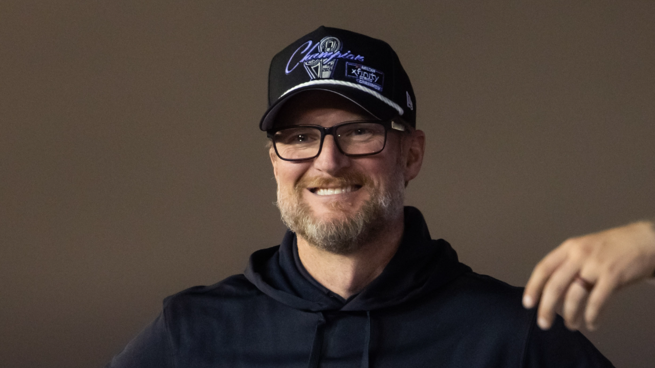 NASCAR Xfinity Series team owner Dale Earnhardt Jr celebrates with driver Justin Allgaier after winning the 2024 Xfinity Series championship during the Championship race at Phoenix Raceway.