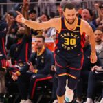 Golden State Warriors guard Stephen Curry (30) celebrates ahead of the Warriors bench after scoring a three point basket against the Chicago Bulls during the third quarter at Chase Center.