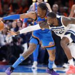 Oklahoma City Thunder forward Jalen Williams (8) steals the ball away from Minnesota Timberwolves forward Julius Randle (30) during the second half at Paycom Center