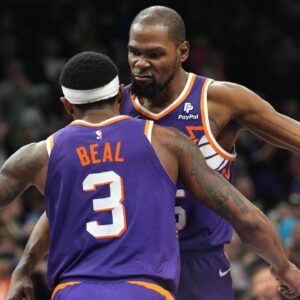 Phoenix Suns guard Bradley Beal (3) and Phoenix Suns forward Kevin Durant (35) hug during the second half of the game against the Indiana Pacers at Footprint Center