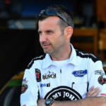 NASCAR Cup Series crew chief Adam Stevens (L) and NASCAR Cup Series crew chief Rodney Childers (R) talk during practice for the 1000Bulbs.com 500 at Talladega Superspeedway.
