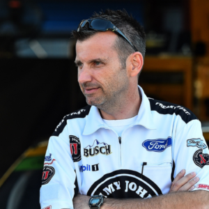 NASCAR Cup Series crew chief Adam Stevens (L) and NASCAR Cup Series crew chief Rodney Childers (R) talk during practice for the 1000Bulbs.com 500 at Talladega Superspeedway.
