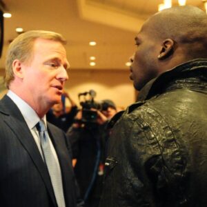 February 4, 2011; Dallas, TX, USA; NFL commissioner Roger Goodell (left) talks with Cincinnati Bengals wide receiver Chad Ochocinco prior to a press conference at the Super Bowl XLV media center.