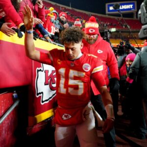 Jan 18, 2025; Kansas City, Missouri, USA; Kansas City Chiefs quarterback Patrick Mahomes (15) shakes hands with fans after defeating the Houston Texans in a 2025 AFC divisional round game at GEHA Field at Arrowhead Stadium.