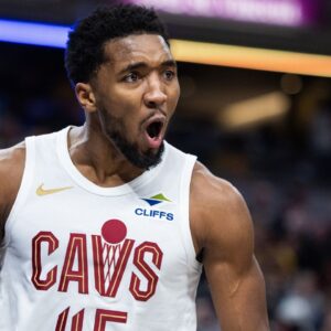 Cleveland Cavaliers guard Donovan Mitchell (45) reacts to a made shot and foul the first half against the Indiana Pacers at Gainbridge Fieldhouse