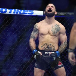 Mike Perry (blue gloves) reacts before a bout against Geoff Neal (not pictured) during UFC 245 at T-Mobile Arena.