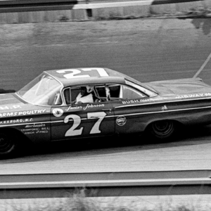 Driver Junior Johnson (27) battles for position in the rain-abbreviated Nashville 500. © Harold Lowe Jr. / The Tennessean, Nashville Tennessean via Imagn Content Services, LLC.