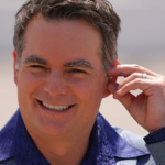 May 9, 2021; Darlington, South Carolina, USA; Fox Sports analyst and former NASCAR driver Jeff Gordon walks on pit road prior to the Goodyear 400 at Darlington Raceway. Mandatory Credit: Jasen Vinlove-Imagn Images