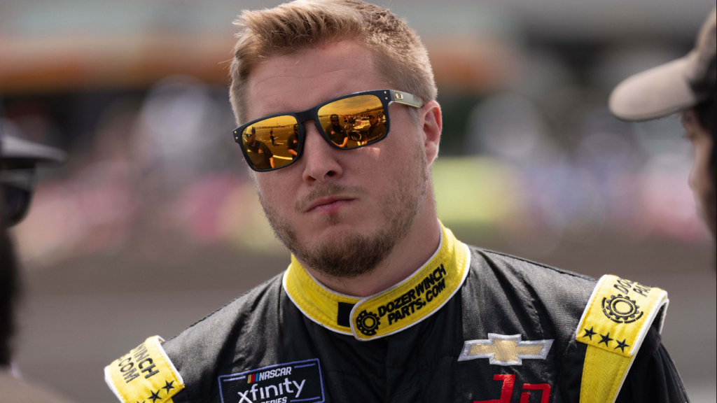 Jun 8, 2024; Sonoma, California, USA; NASCAR Xfinity Series driver Garrett Smithley (4) before the start of the NASCAR Xfinity Sonoma 250 at Sonoma Raceway. Mandatory Credit: Stan Szeto-Imagn Images