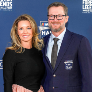 Jan 19, 2024; Charlotte, NC, USA; Dale Earnhardt Jr. and his wife Amy during the red carpet at Charlotte Convention Center Crown Ballroom. Mandatory Credit: Jim Dedmon-Imagn Images