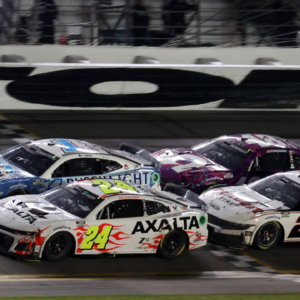 NASCAR Cup Series driver William Byron (24) leads driver Ross Chastain (1) during the Daytona 500 at Daytona International Speedway.