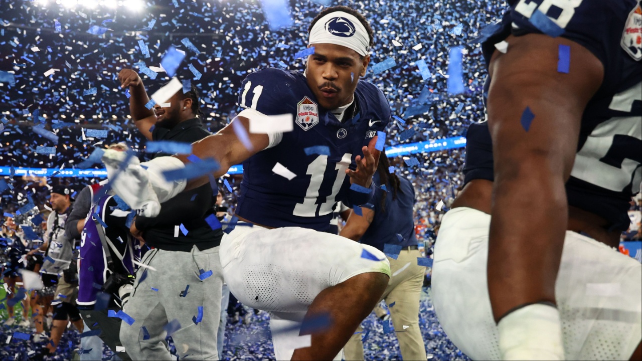 Penn State Nittany Lions defensive end Abdul Carter (11) reacts with teammates after defeating the Boise State Broncos in the Fiesta Bowl at State Farm Stadium.
