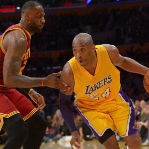 Cleveland Cavaliers forward LeBron James (23) guards Los Angeles Lakers forward Kobe Bryant (24) on the court in the first half of the game at Staples Center.