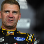 Feb 12, 2020; Daytona, FL, USA; NASCAR Cup Series driver Clint Bowyer (14) addresses the media during NASCAR Media Day at the Daytona 500 Club. Mandatory Credit: Mike Dinovo-Imagn Images