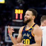Golden State Warriors guard Stephen Curry (30) reacts during the third quarter against the Miami Heat at Chase Center.