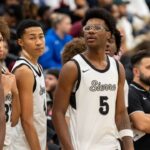 Sierra Canyon’s Bryce James (5), the son of NBA player LeBron James, stands with his teammates by the bench before the game between Sierra Canyon and Bartlett High School during Memphis Hoopfest in Eads, Tenn., on Friday, January 3, 2025.
