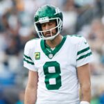 New York Jets quarterback Aaron Rodgers (8) reacts after a missed throw against the Jacksonville Jaguars during the first quarter at EverBank Stadium.