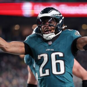 Jan 26, 2025; Philadelphia, PA, USA; Philadelphia Eagles running back Saquon Barkley (26) celebrates after a touchdown against the Washington Commanders during the second half in the NFC Championship game at Lincoln Financial Field.