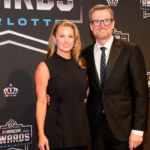 Nov 22, 2024; Charlotte, NC, USA; Dale Earnhardt Jr. and wife Amy during the NASCAR Awards Banquet at Charlotte Convention Center. Mandatory Credit: Jim Dedmon-Imagn Images