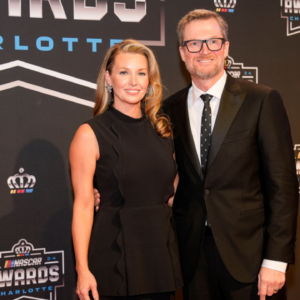 Nov 22, 2024; Charlotte, NC, USA; Dale Earnhardt Jr. and wife Amy during the NASCAR Awards Banquet at Charlotte Convention Center. Mandatory Credit: Jim Dedmon-Imagn Images