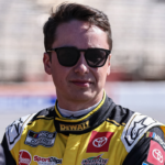 NASCAR Cup Series driver Christopher Bell (20) on pit road prior to qualifying for the Ambetter Health 400 at Atlanta Motor Speedway.